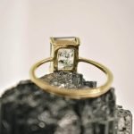 the back of Emerald Cut moss agate ring