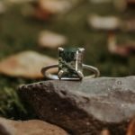 the front of Emerald Cut moss agate ring
