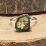 front of Uncut Moss Agate Ring