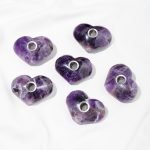 a group of heart shaped amethyst crystal pipe